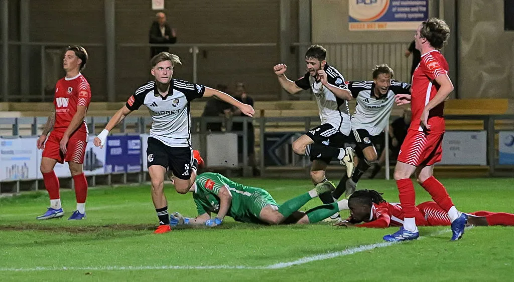 Dartford players celebrate a goal against Ramsgate at Princes Park in September 2026.