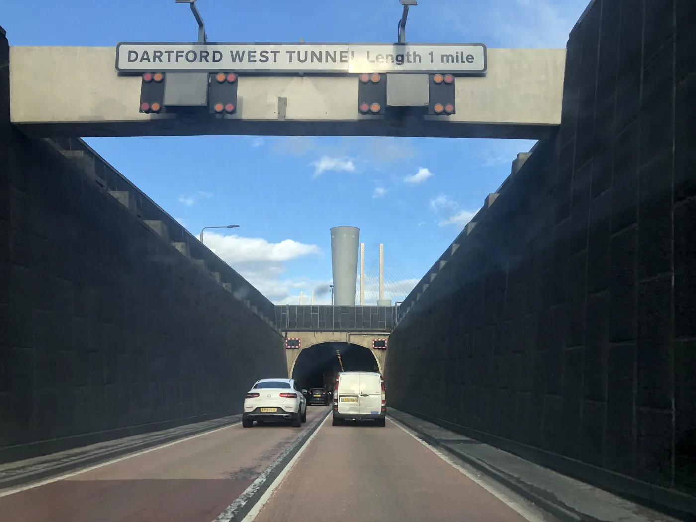 The northbound approach to the Dartford west tunnel, with the QEII Bridge behind it. Photographed in February 2022